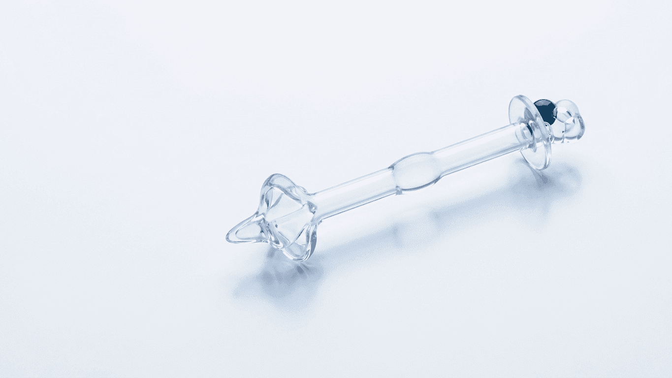 Studio-style rendering of the translucent silicone controlled catheter, showing its four-lobed tip, bulged shaft section, baffle disc and dark ball valve